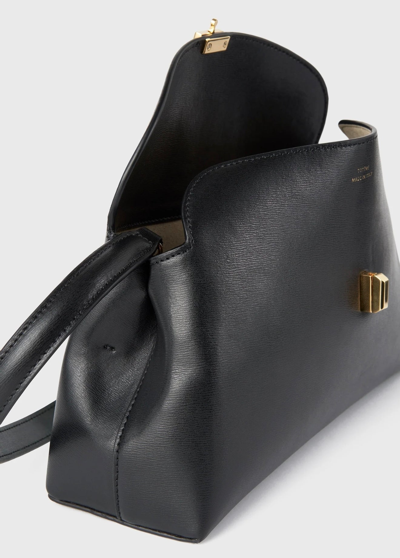 Toteme T-Lock Clutch Leather Black Gold