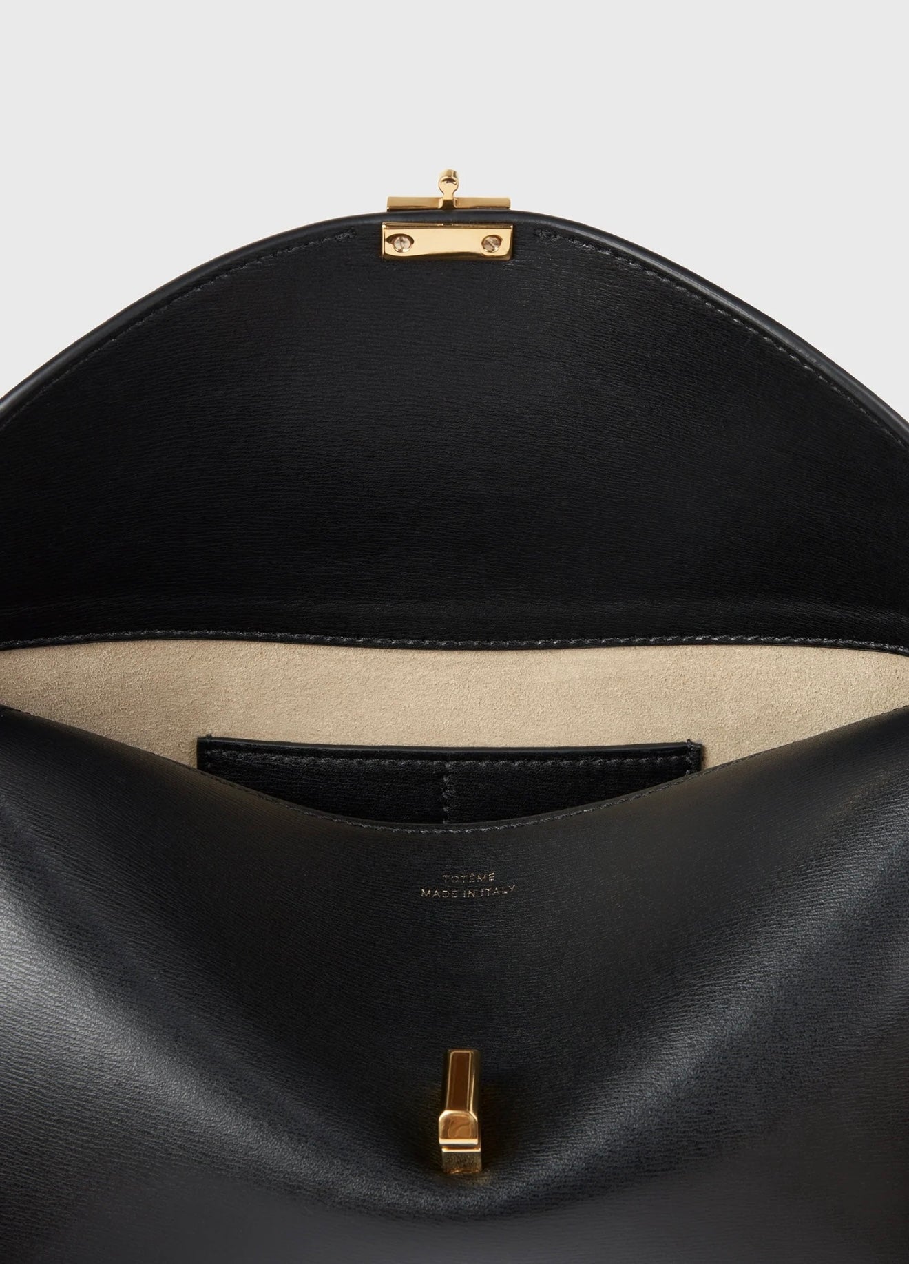 Toteme T-Lock Clutch Leather Black Gold