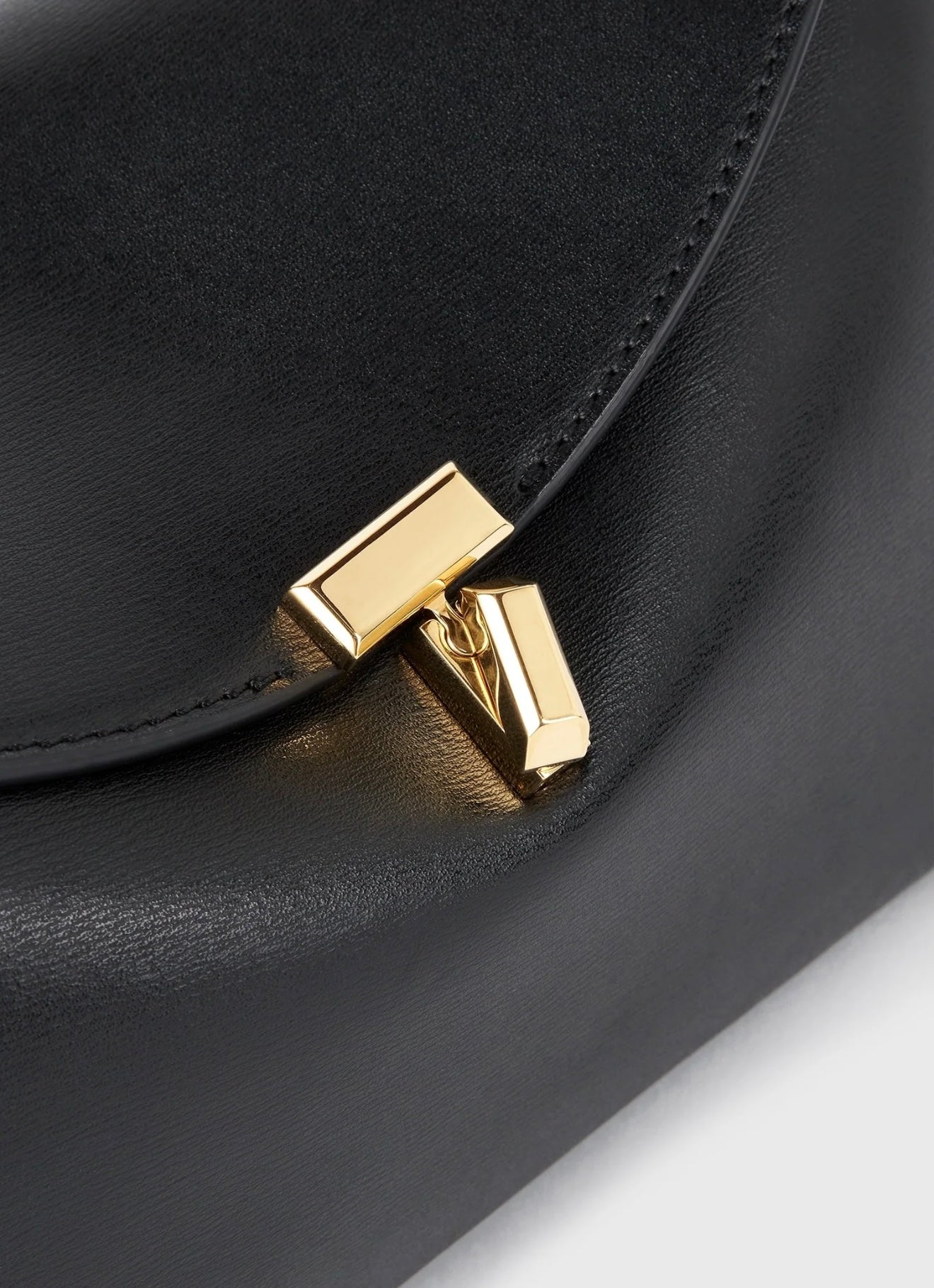 Toteme T-Lock Clutch Leather Black Gold