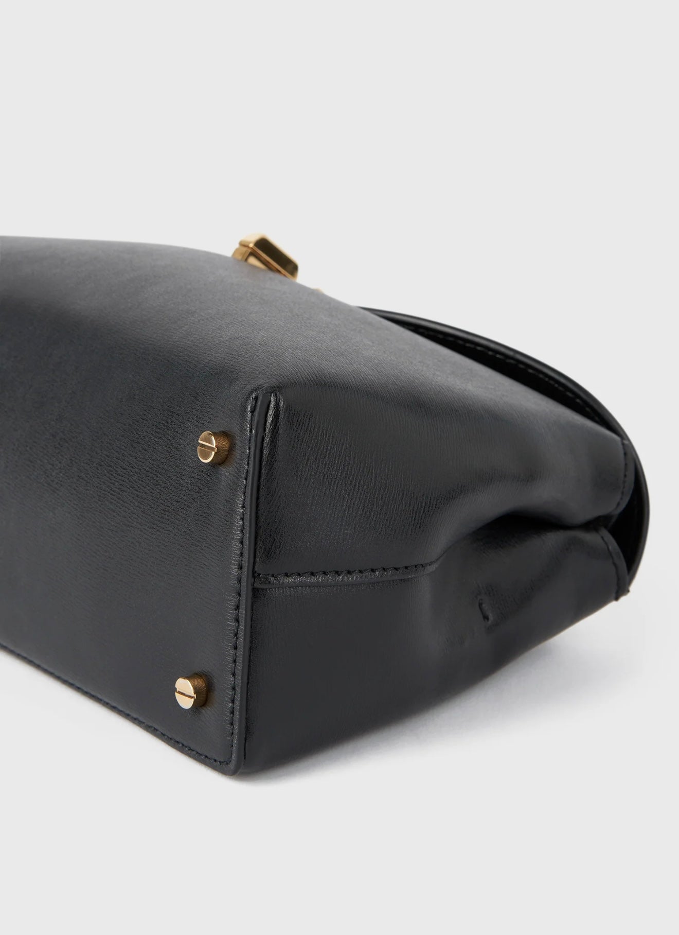 Toteme T-Lock Clutch Leather Black Gold